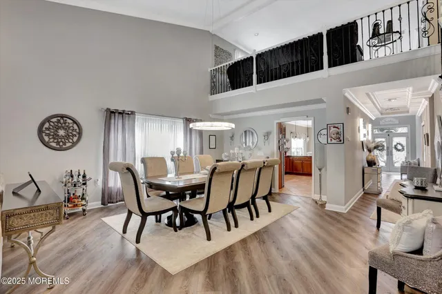 a bedroom with a bed and a large mirror