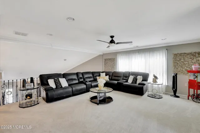 a view of a patio with table and chairs and potted plants