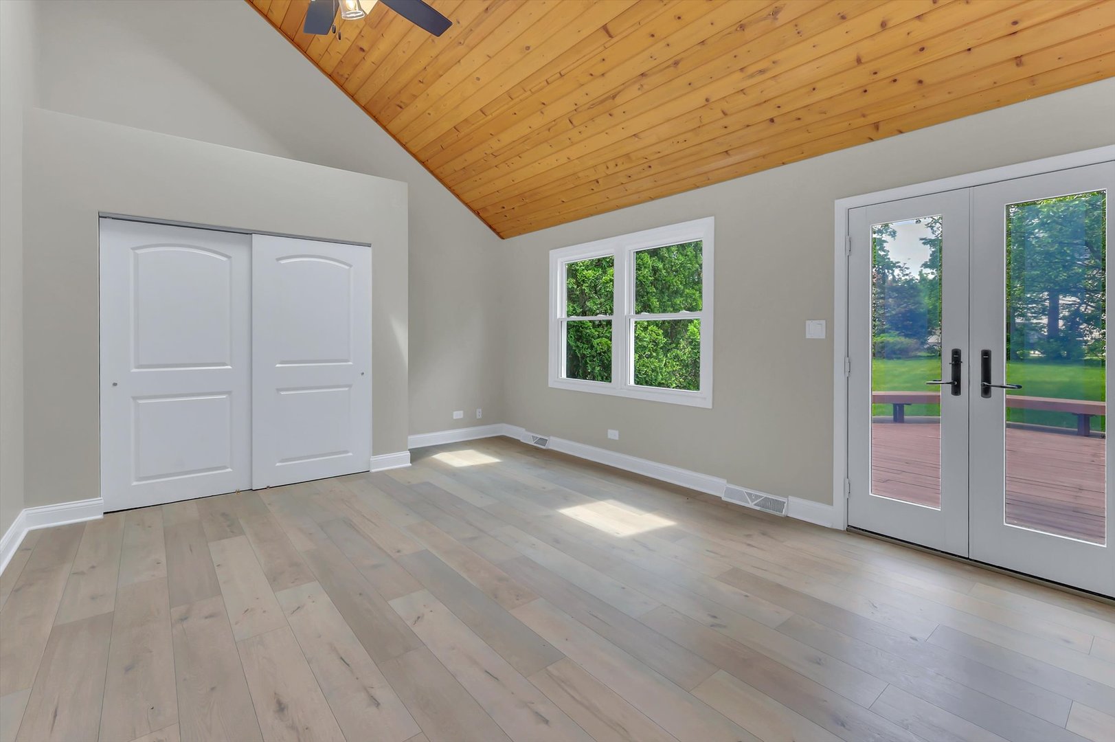 967 West Bauer Road Naperville, IL 60563 - Photo 20 of 37 an empty room with wooden floor and windows