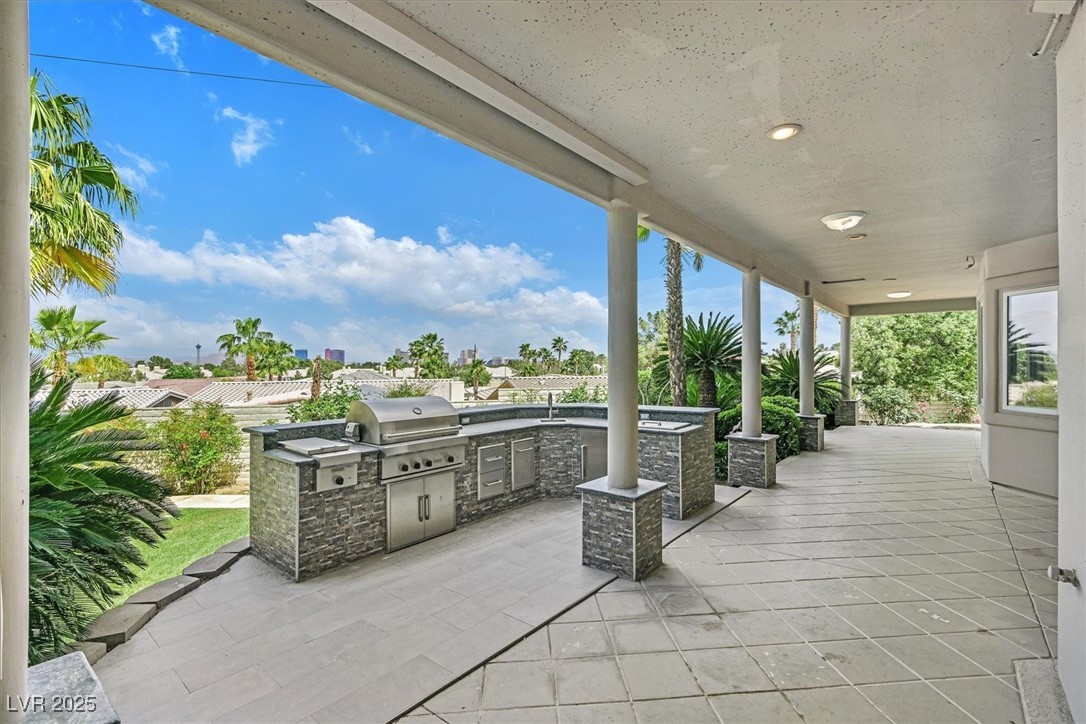3372 Westwind Road Las Vegas, NV 89146 - Photo 8 of 39 View of patio with exterior kitchen and a sink