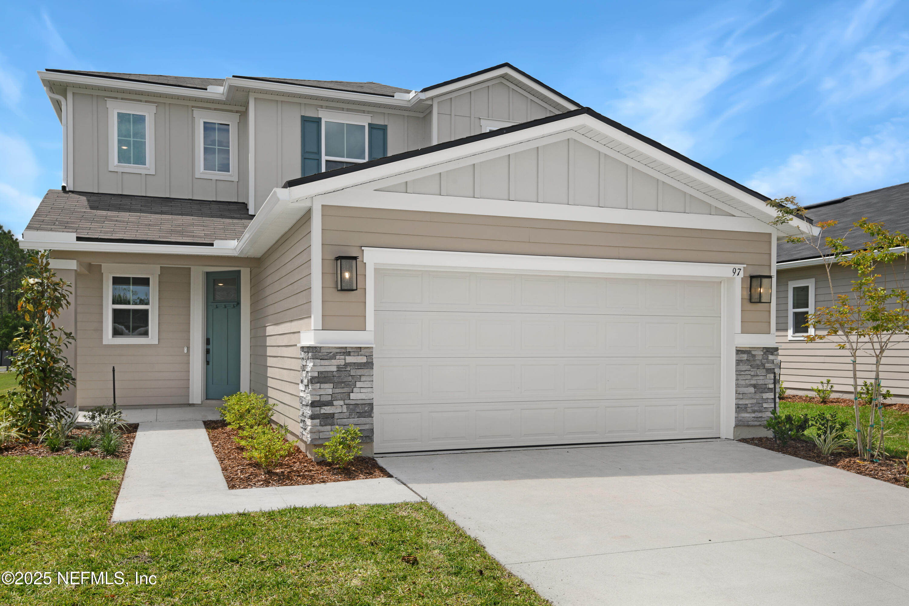 97 Arbor Alcove Lane St. Augustine, FL 32084 - Photo 1 of 22 a front view of a house with a yard