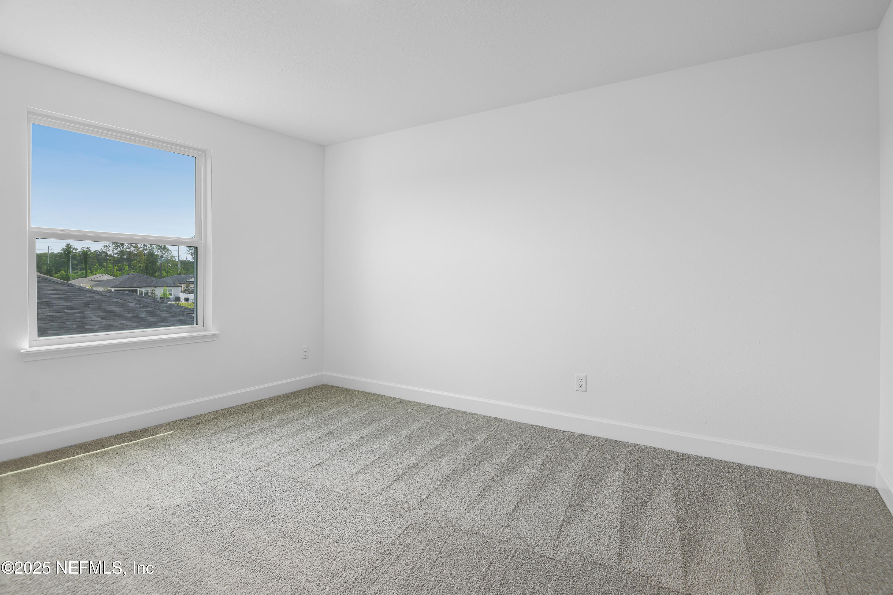 97 Arbor Alcove Lane St. Augustine, FL 32084 - Photo 11 of 22 an empty room with a window