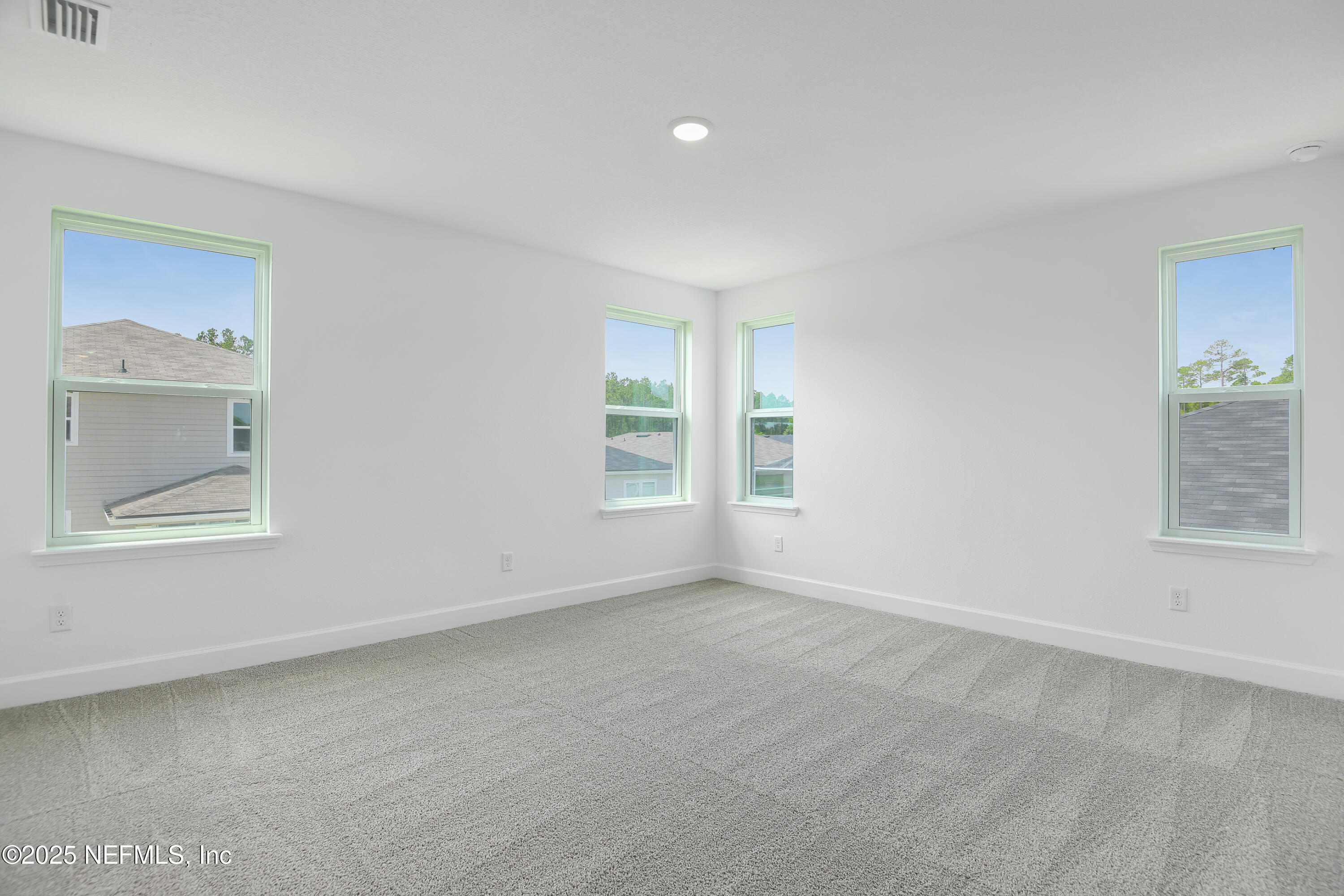 97 Arbor Alcove Lane St. Augustine, FL 32084 - Photo 12 of 22 an empty room with a window