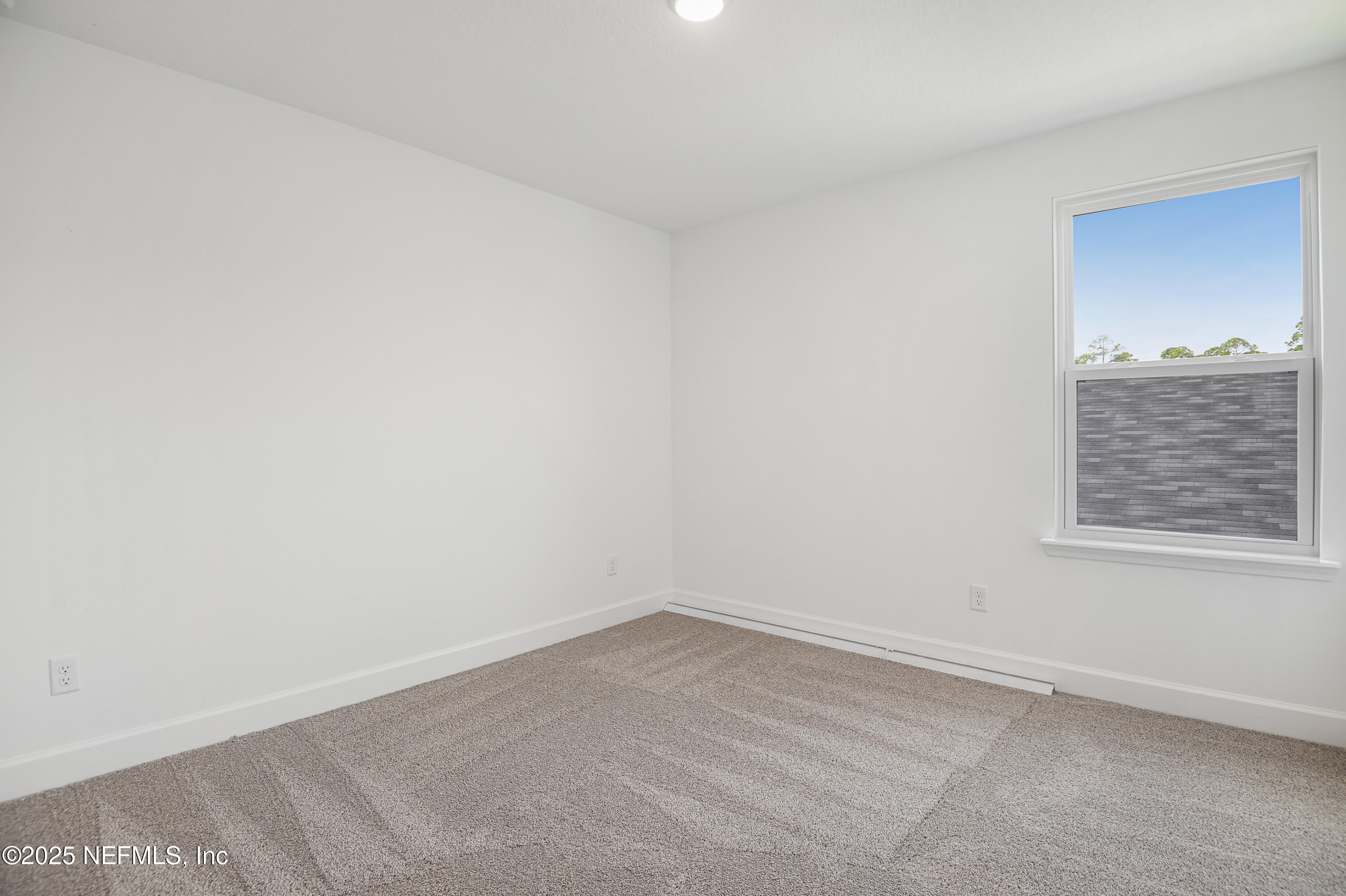 97 Arbor Alcove Lane St. Augustine, FL 32084 - Photo 15 of 22 an empty room with a window