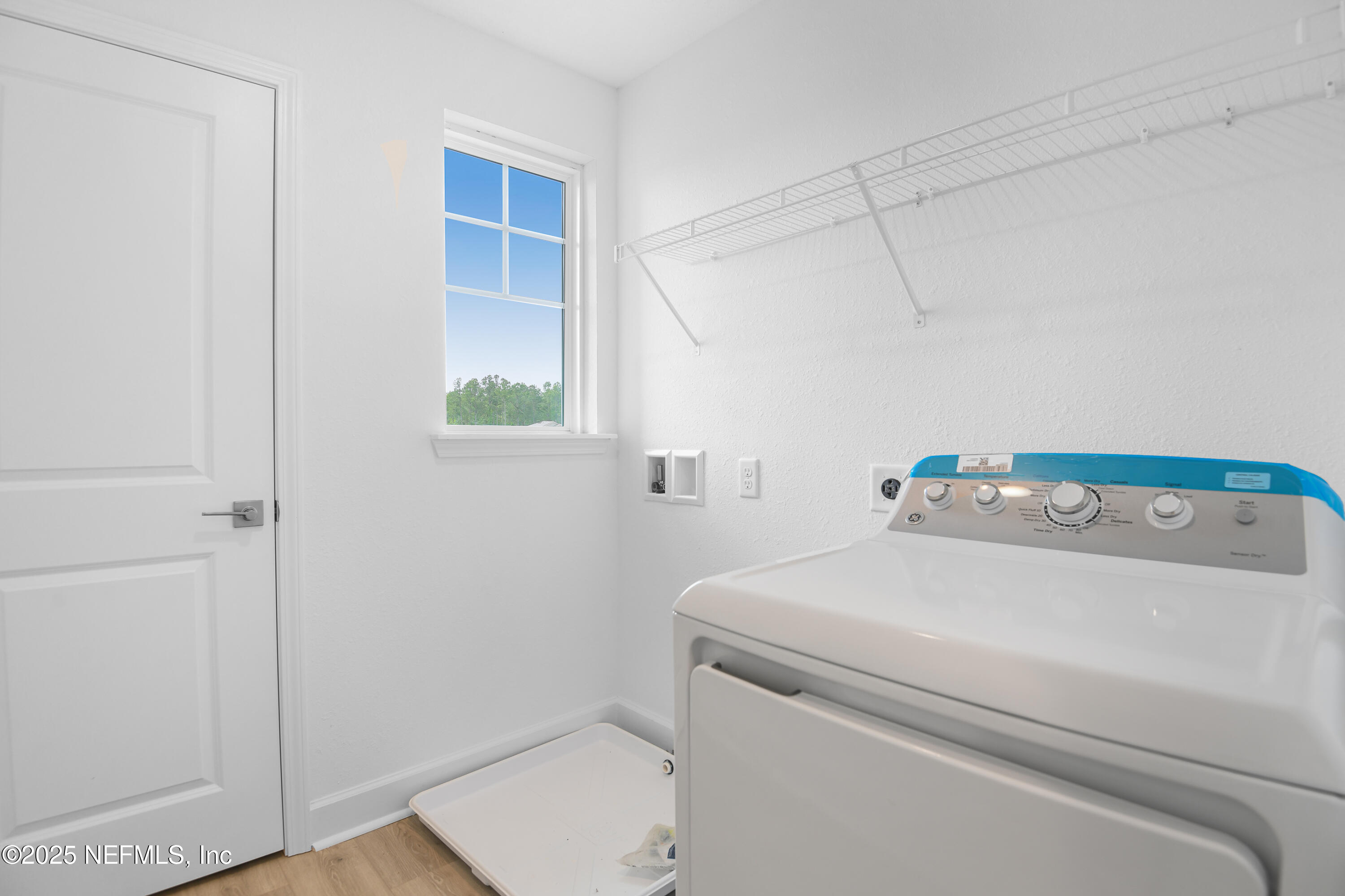 97 Arbor Alcove Lane St. Augustine, FL 32084 - Photo 18 of 22 a utility room with dryer and washer