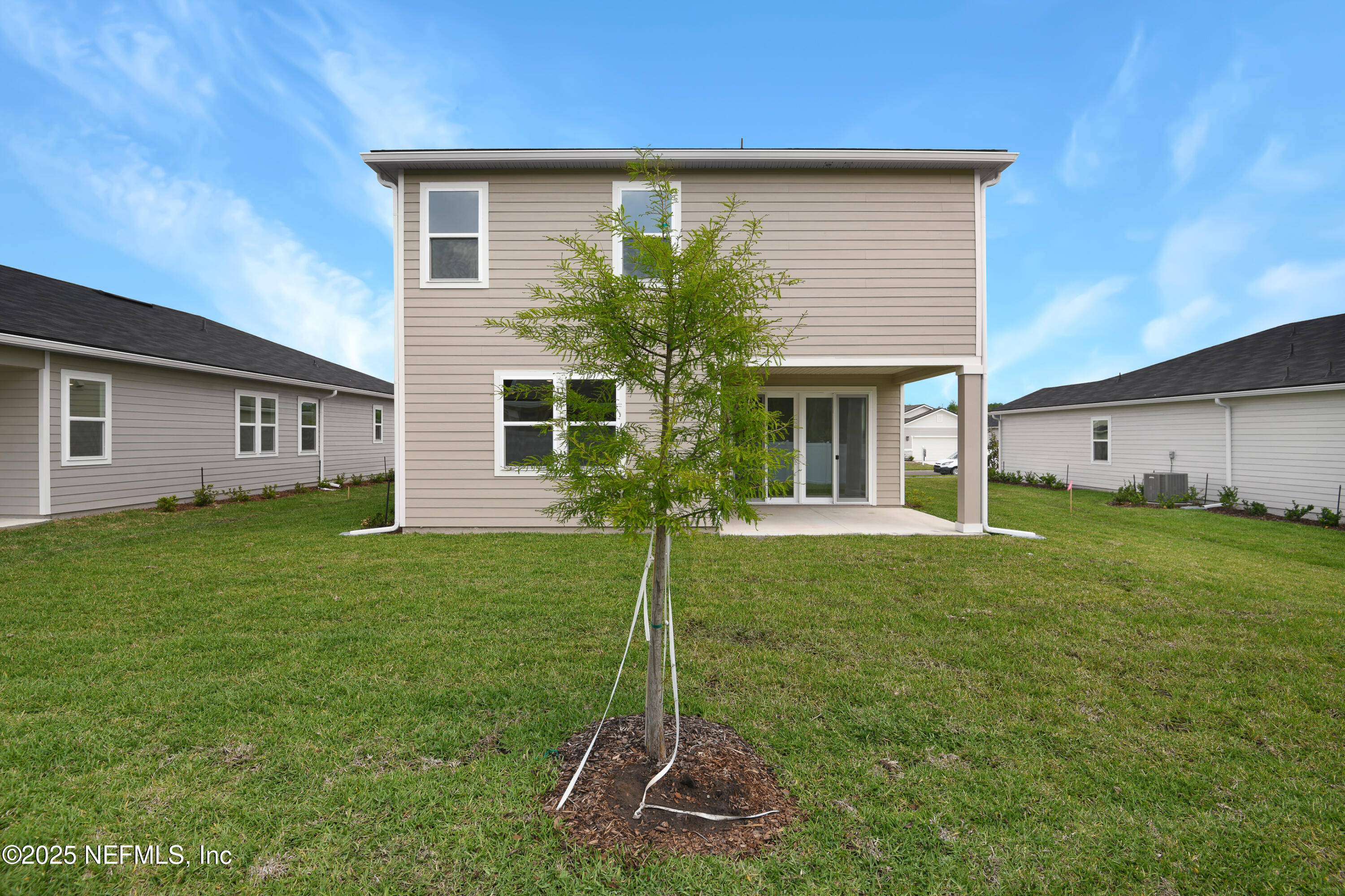 97 Arbor Alcove Lane St. Augustine, FL 32084 - Photo 20 of 22 a house view with a garden space