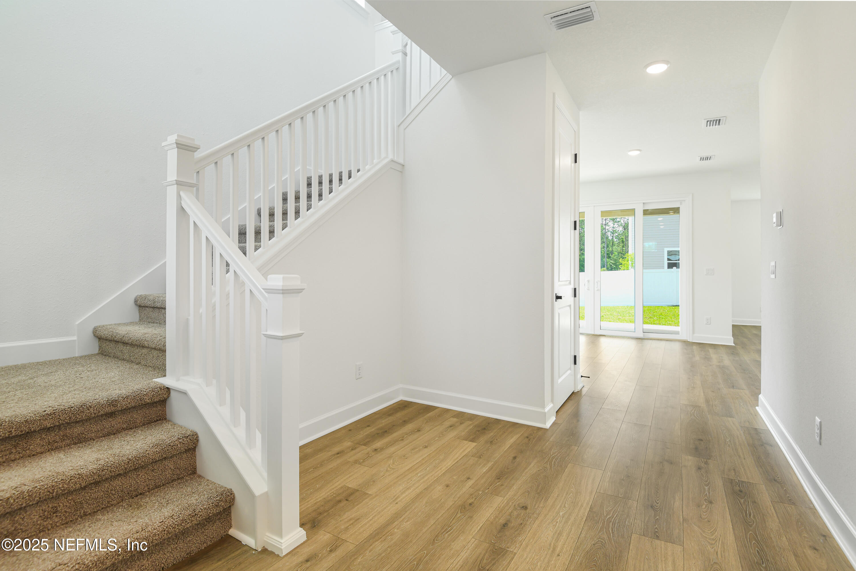 97 Arbor Alcove Lane St. Augustine, FL 32084 - Photo 3 of 22 a view of entryway and hall with wooden floor