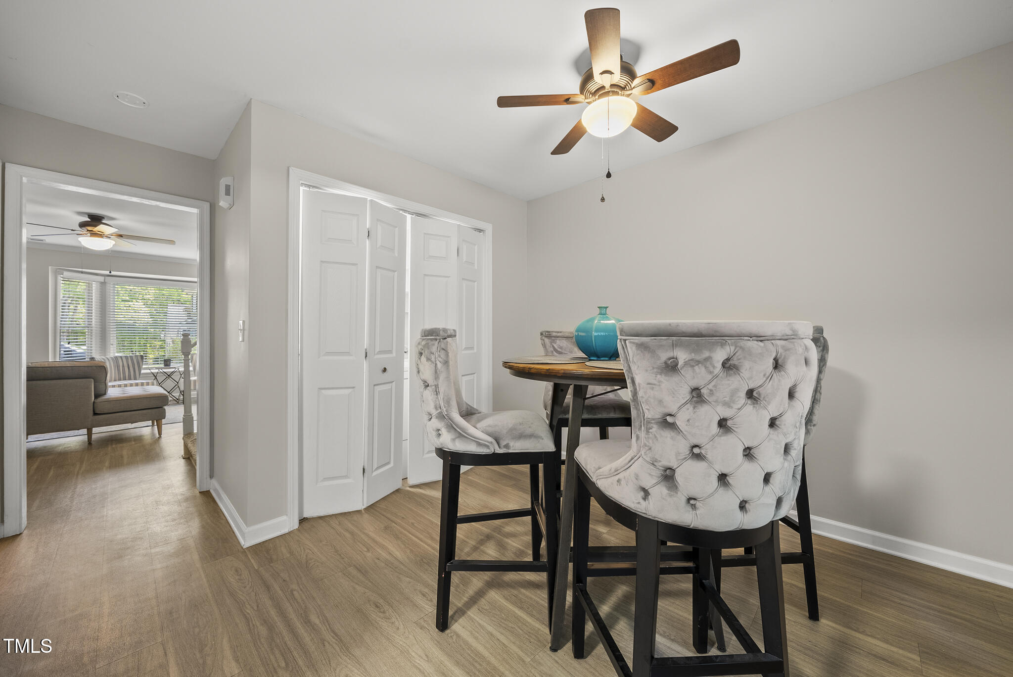 710 Powell Drive, Unit F Raleigh, NC 27606 - Photo 12 of 32 a view of a room with furniture and wooden floor