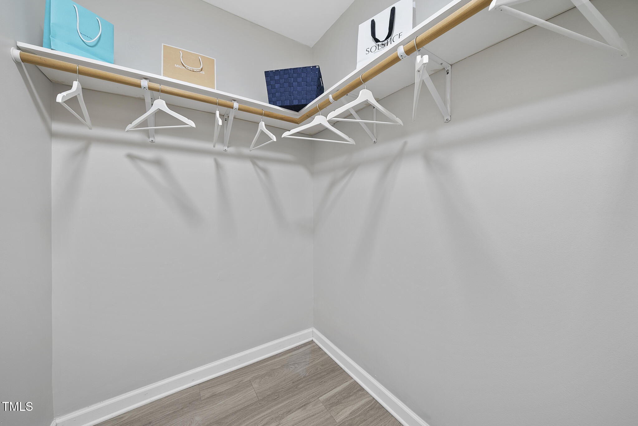 710 Powell Drive, Unit F Raleigh, NC 27606 - Photo 20 of 32 a view of an empty walk in closet