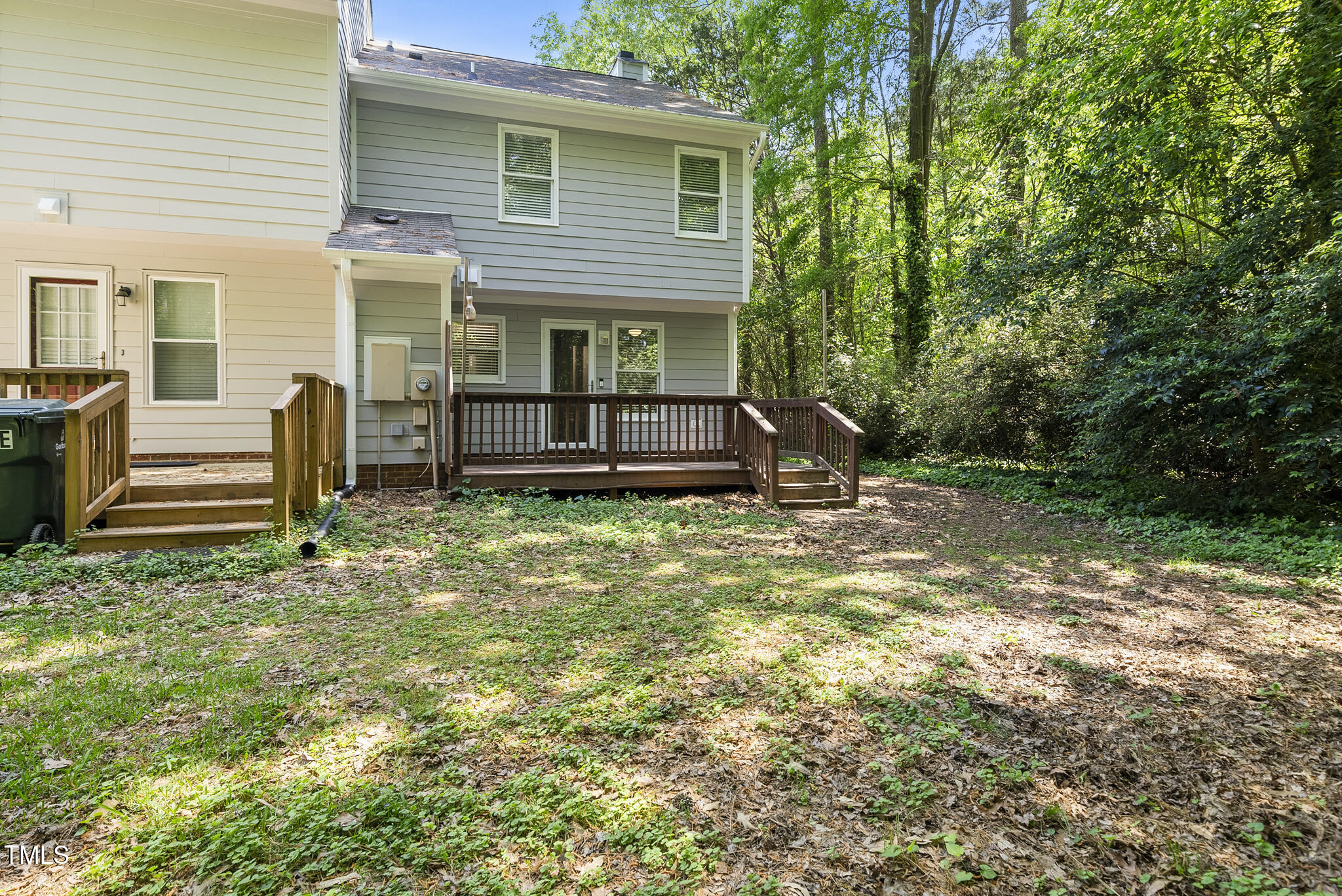 710 Powell Drive, Unit F Raleigh, NC 27606 - Photo 28 of 32 a front view of a house with garden