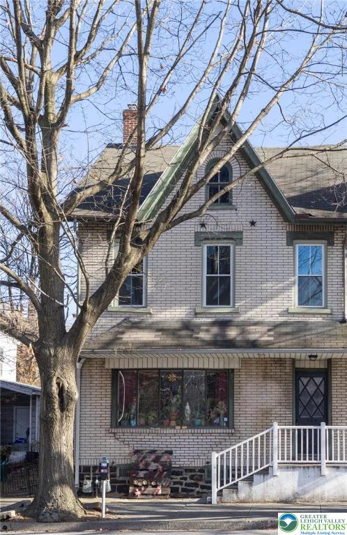 708 Main Street, Unit 2 Bethlehem, PA 18018 - Photo 2 of 18 a front view of a house with large windows