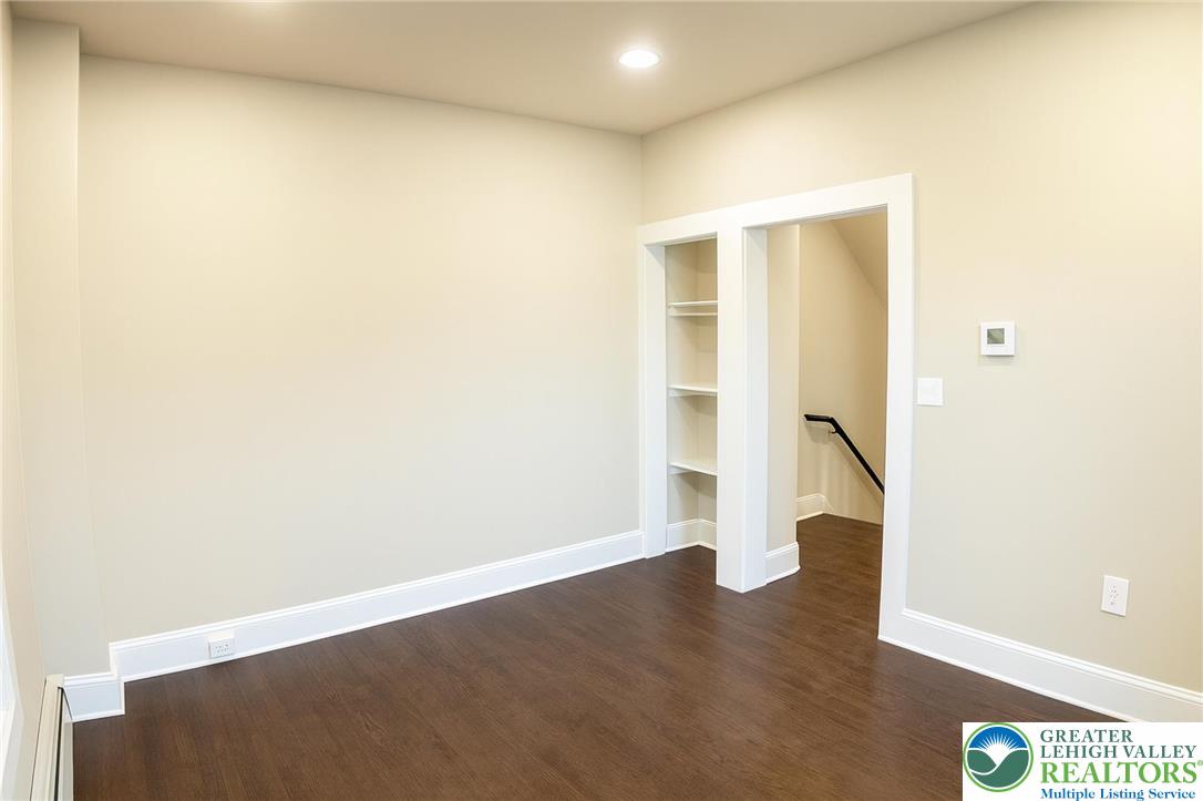 708 Main Street, Unit 2 Bethlehem, PA 18018 - Photo 4 of 18 a view of an empty room with wooden floor
