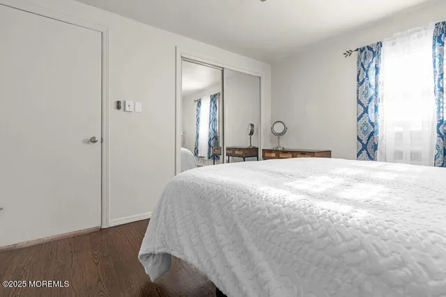 a view of a house with a yard porch and sitting area