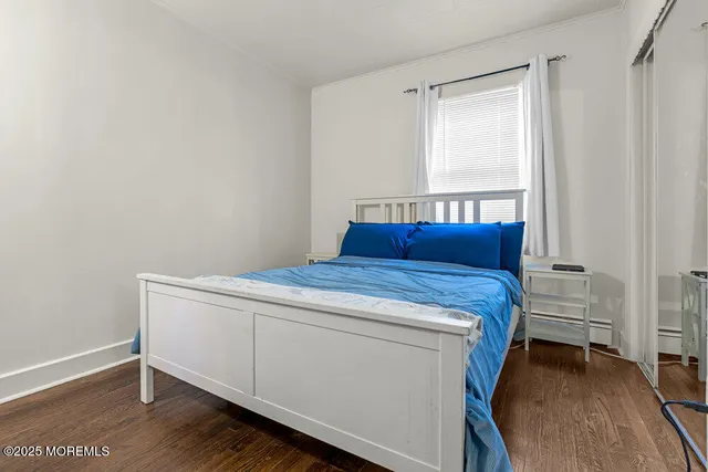 a room with a bed and a window