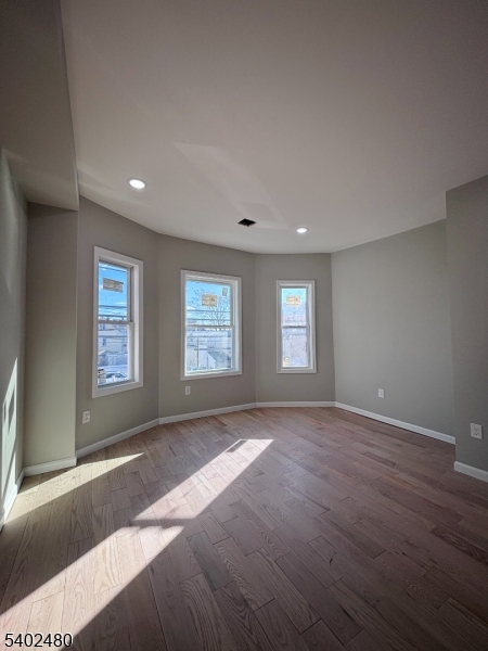 788 East 18th Street, Unit 2 Paterson, NJ 07501 - Photo 2 of 9 a view of an empty room with a window