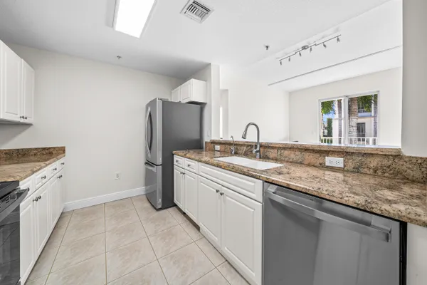 $335,000 | 1203 Town Center Drive, Unit 202, Jupiter, FL 33458