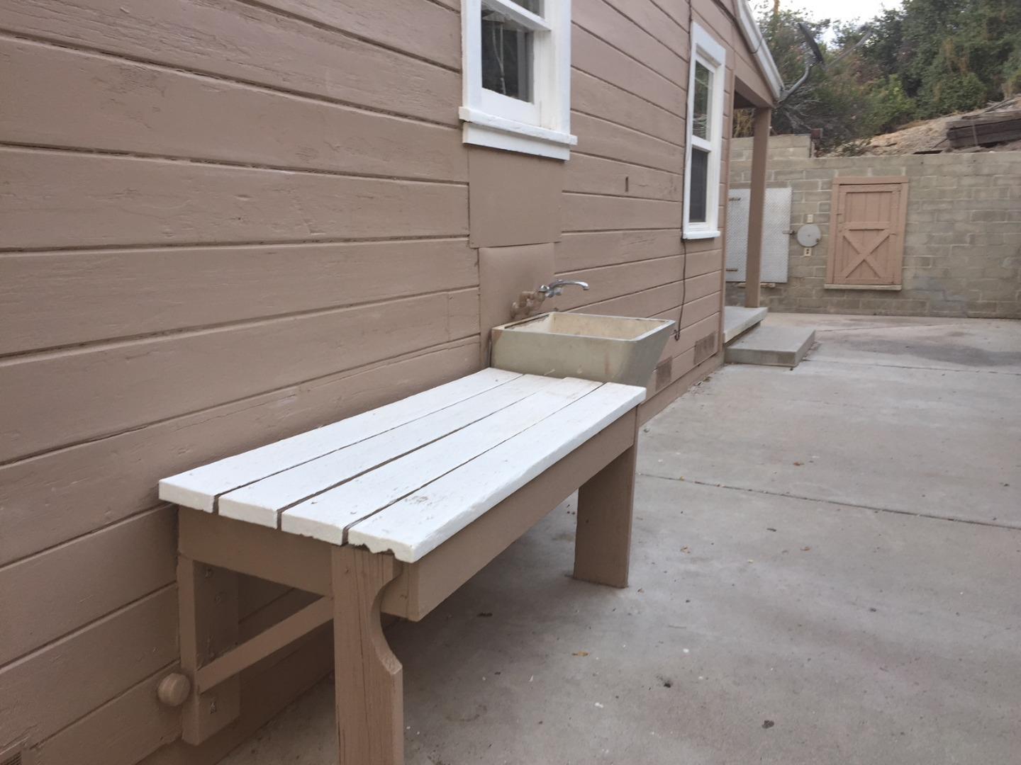 63101 Argyle Road King City, CA 93930 - Photo 2 of 5 a view of a roof deck with wooden floor and fence