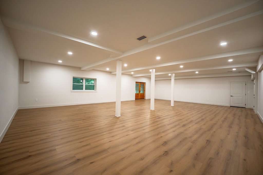 20 Merrifield Road North Bernardston, MA 01337 - Photo 37 of 41 an empty room with wooden floor and windows