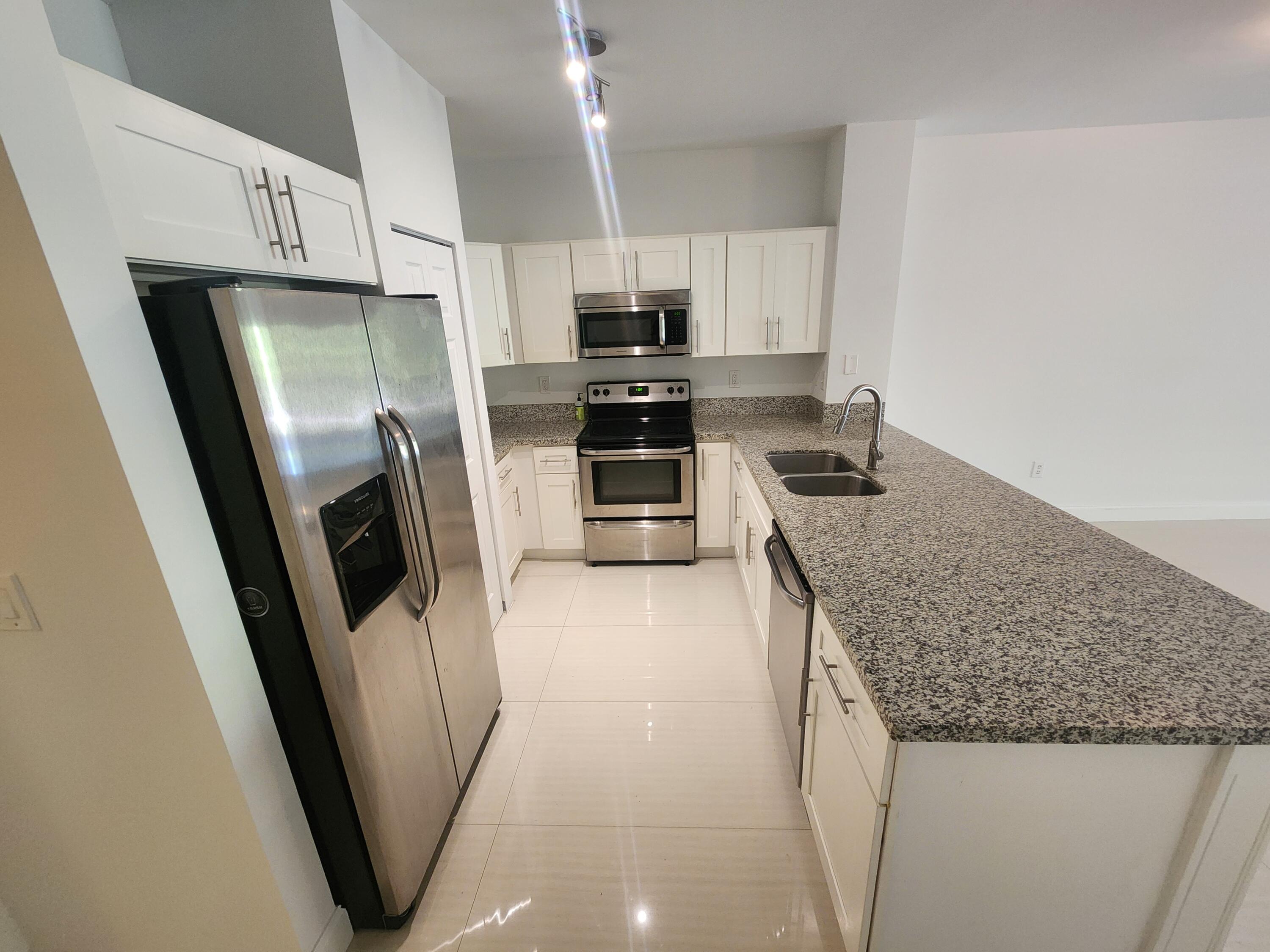 5067 Southeast Mariner Garden Circle Stuart, FL 34997 - Photo 3 of 18 20251210_111750