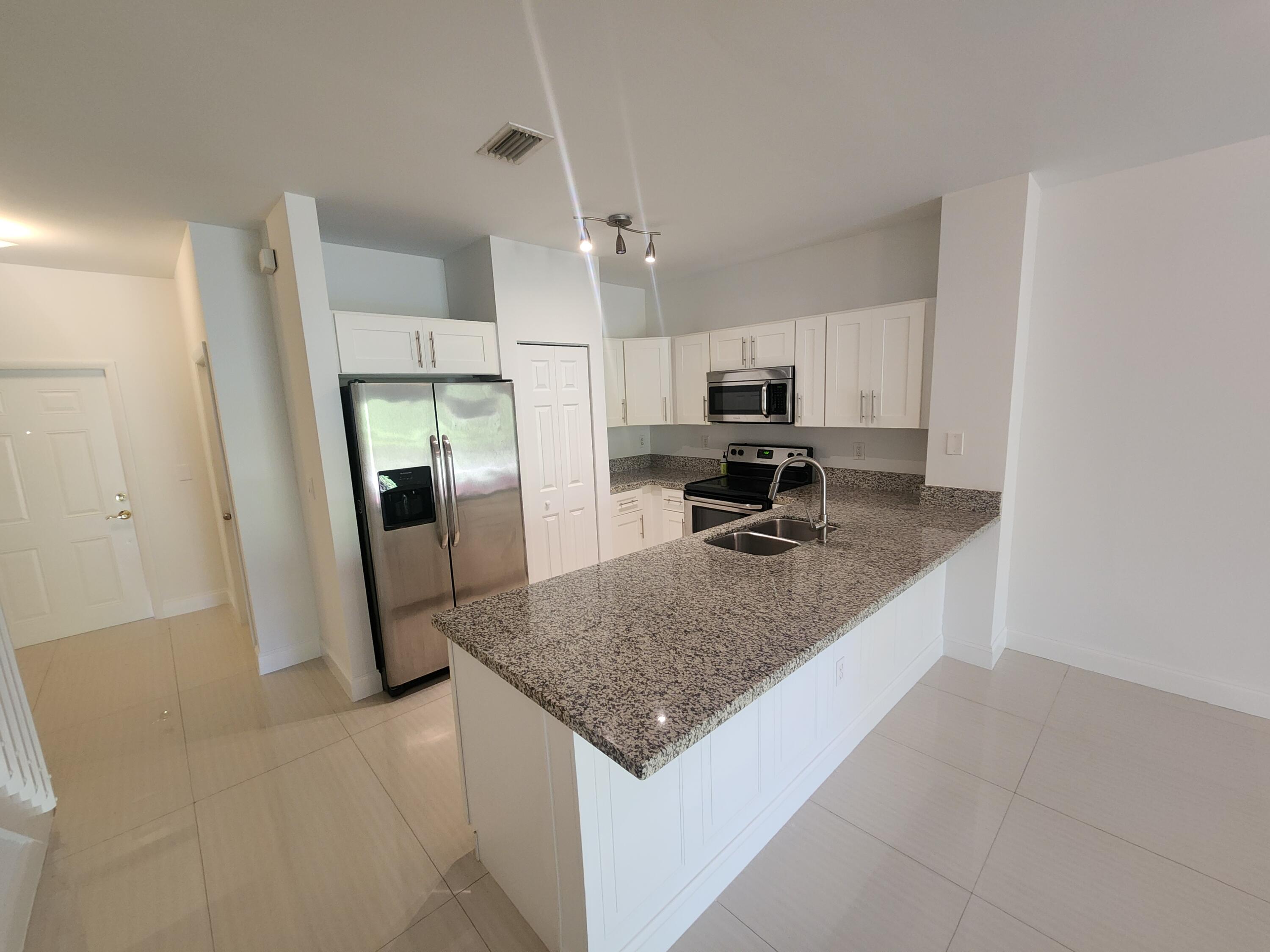 5067 Southeast Mariner Garden Circle Stuart, FL 34997 - Photo 4 of 18 20251210_111744