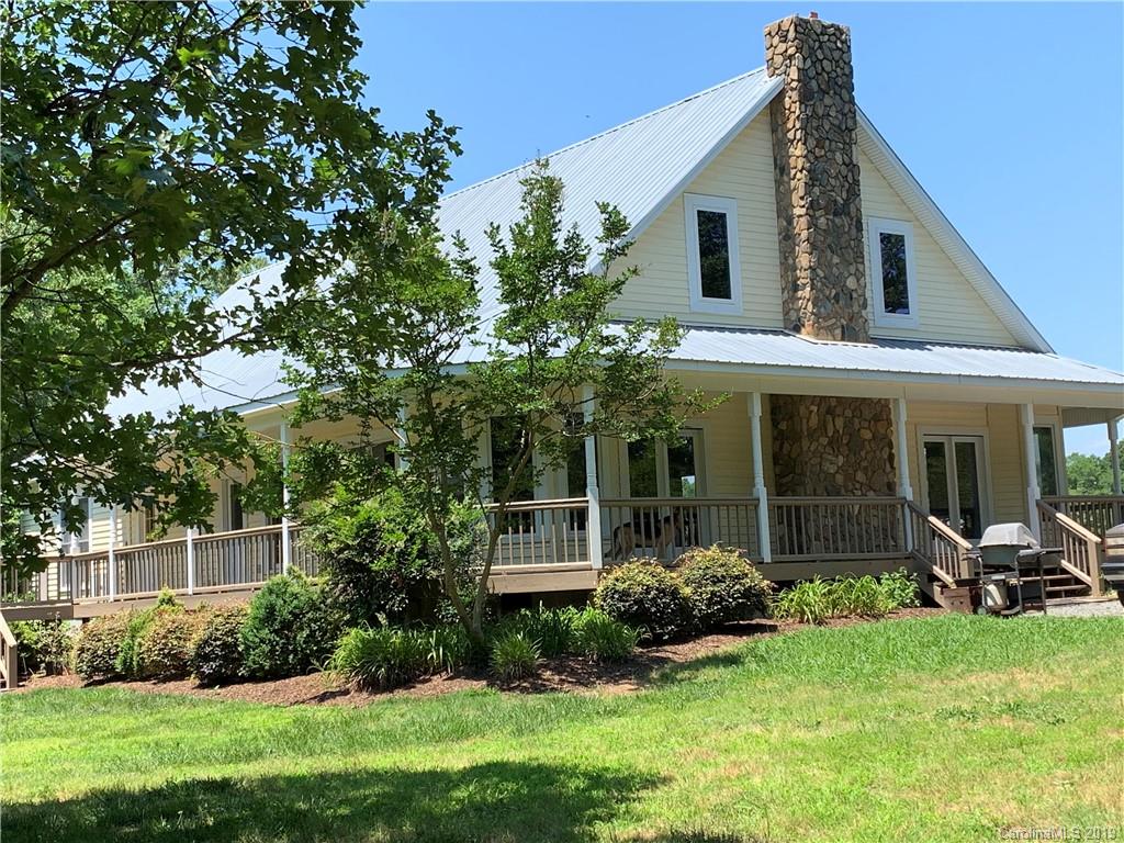 6026 Fish Road Marshville, NC 28103 - Photo 1 of 45 a view of a house with backyard and garden