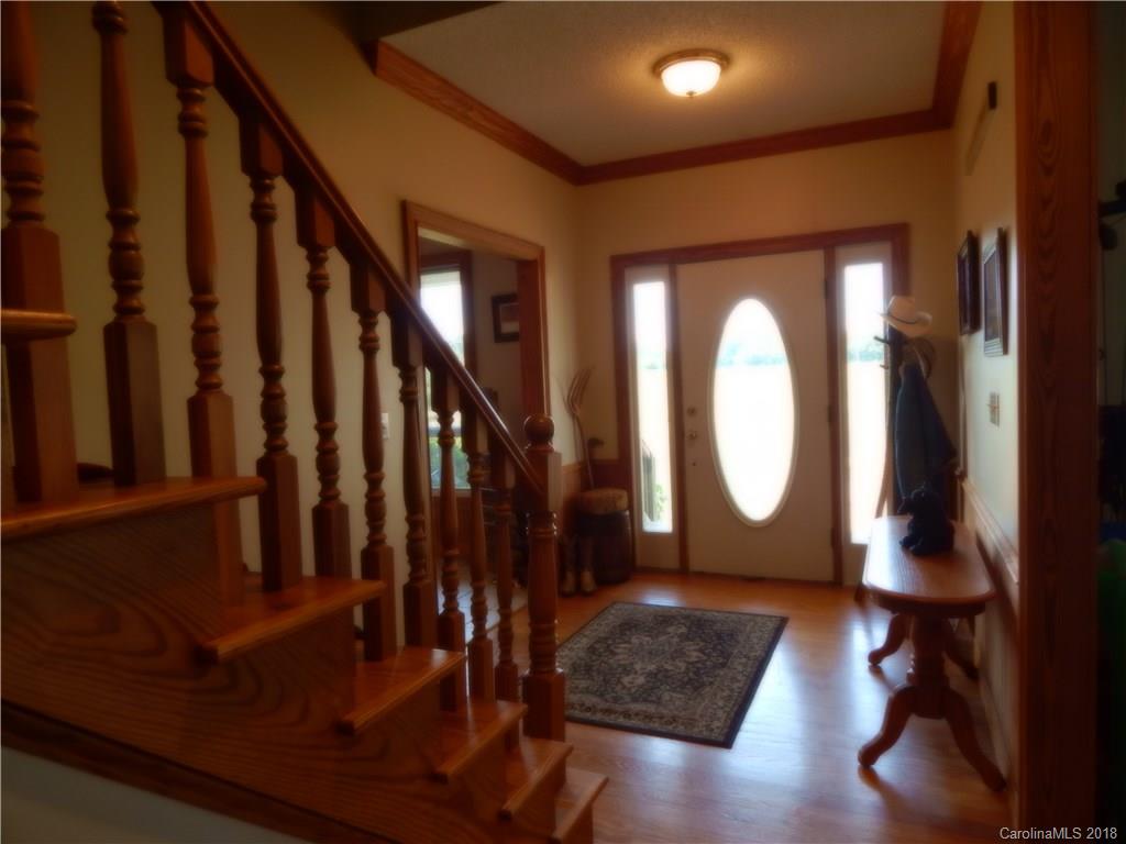 6026 Fish Road Marshville, NC 28103 - Photo 15 of 45 a view of entryway with wooden floor