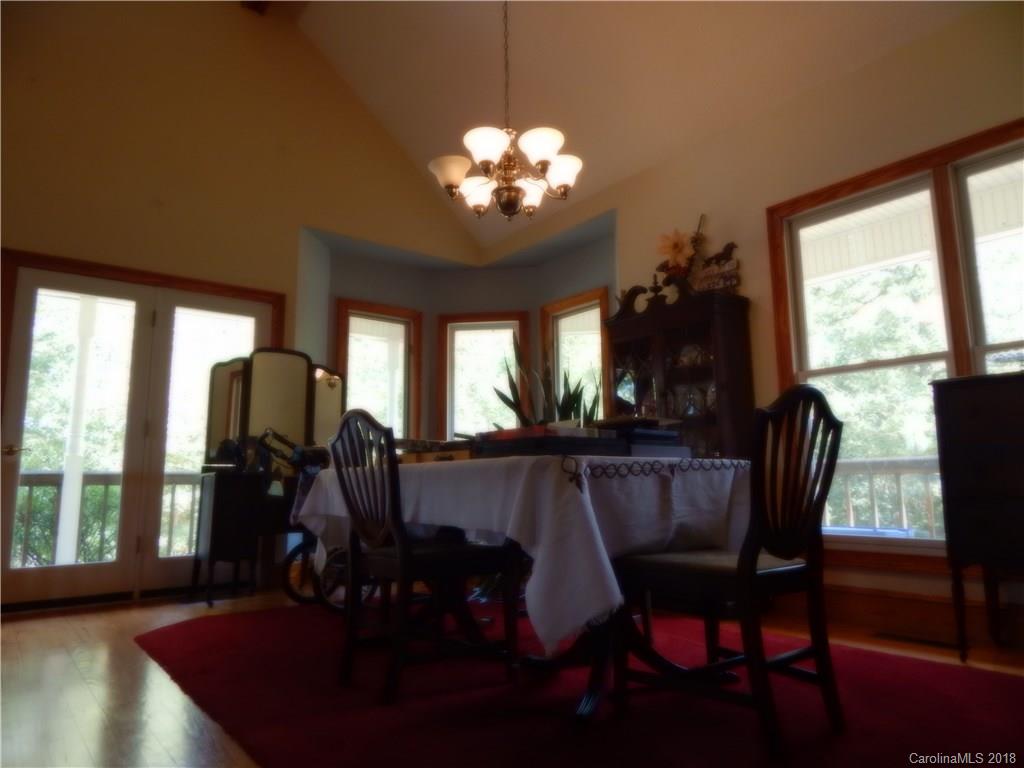 6026 Fish Road Marshville, NC 28103 - Photo 18 of 45 a view of a dining room with furniture window and outside view