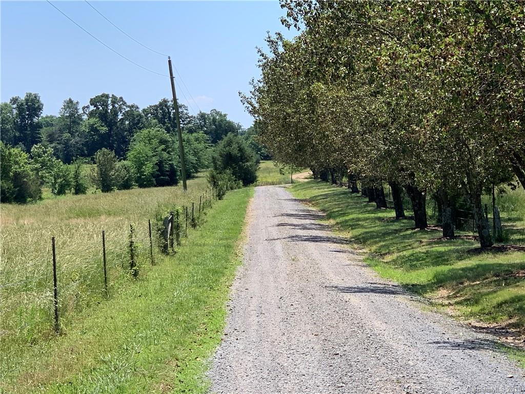 6026 Fish Road Marshville, NC 28103 - Photo 2 of 45 a view of a park with large trees