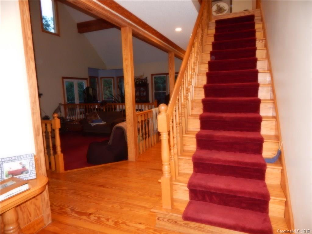 6026 Fish Road Marshville, NC 28103 - Photo 29 of 45 a view of a hallway with wooden floor and windows
