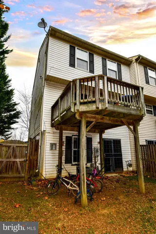 a front view of a house with patio