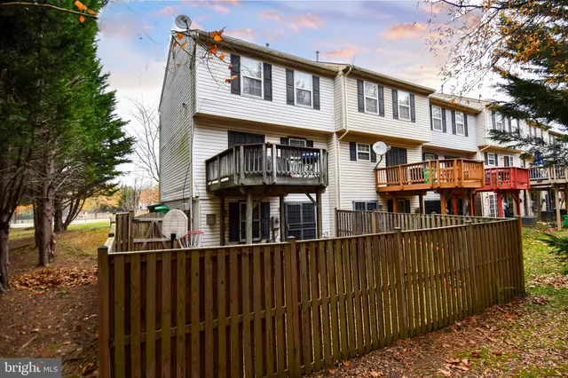 a view of a brick building with many windows