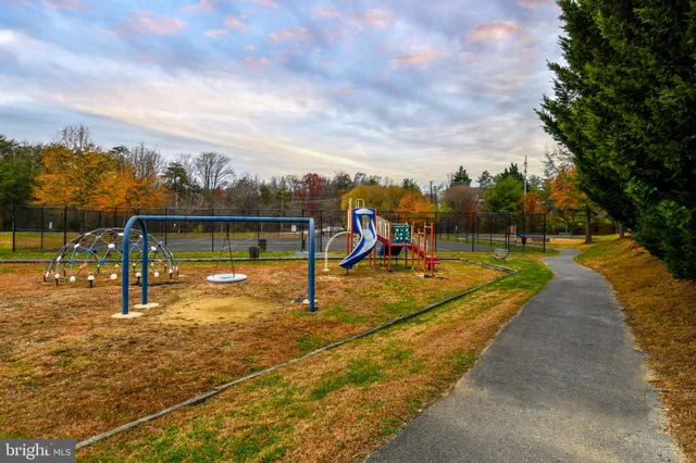 a view of a swimming pool with a lake view