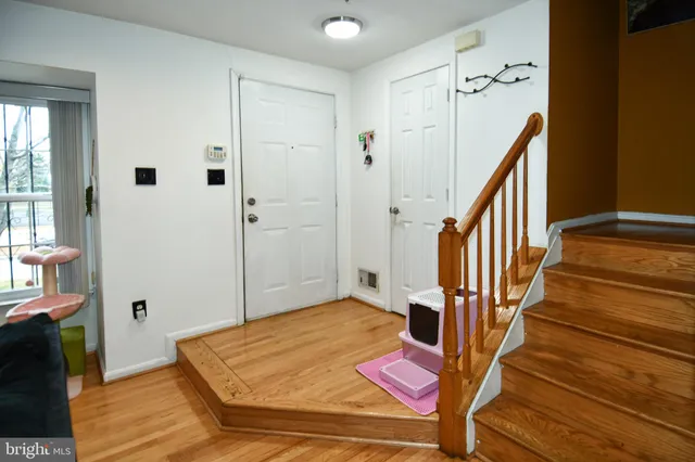 a view of a hallway with staircase