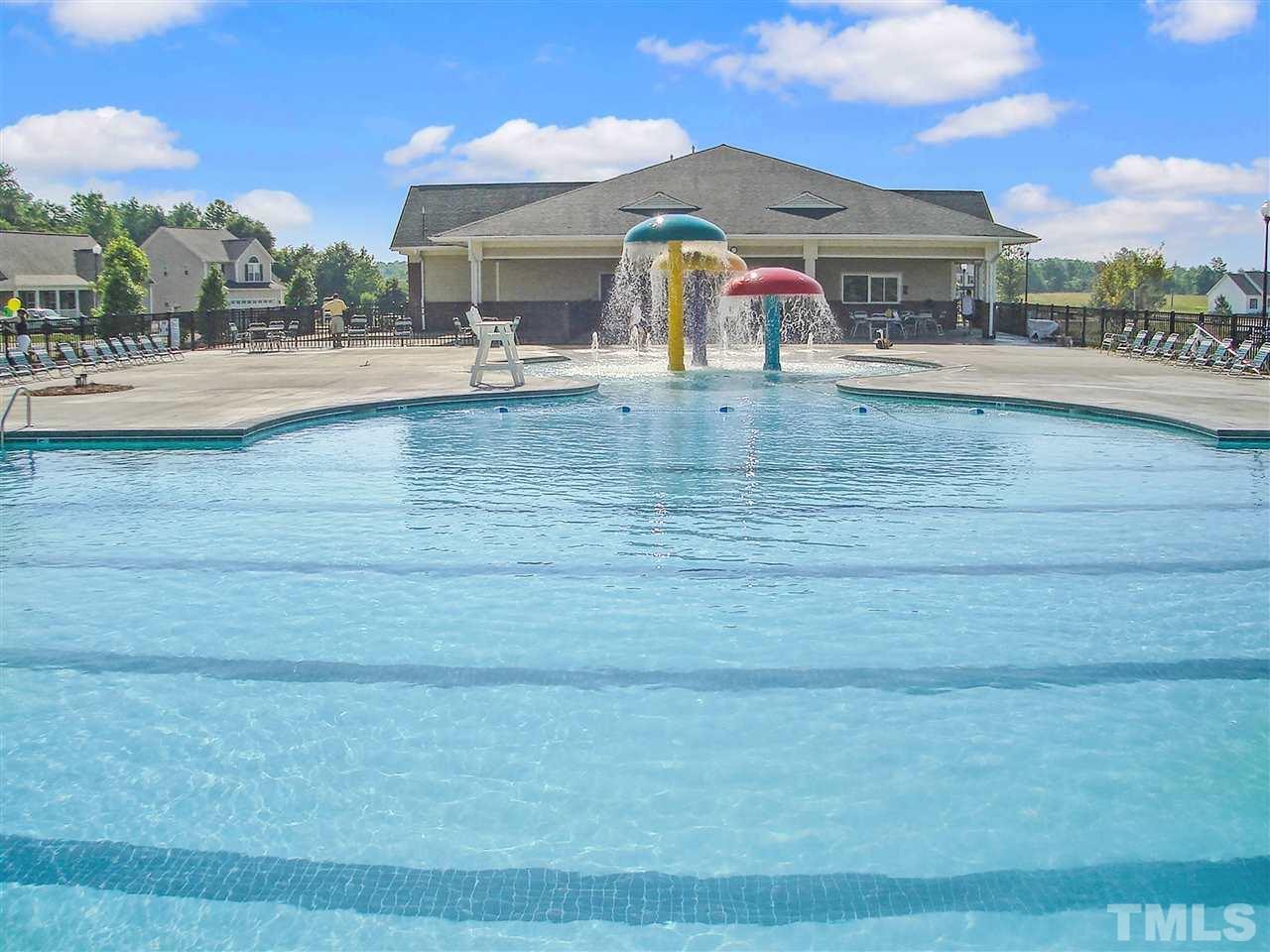 142 Jade Street Smithfield, NC 27577 - Photo 4 of 10 a front view of house with yard