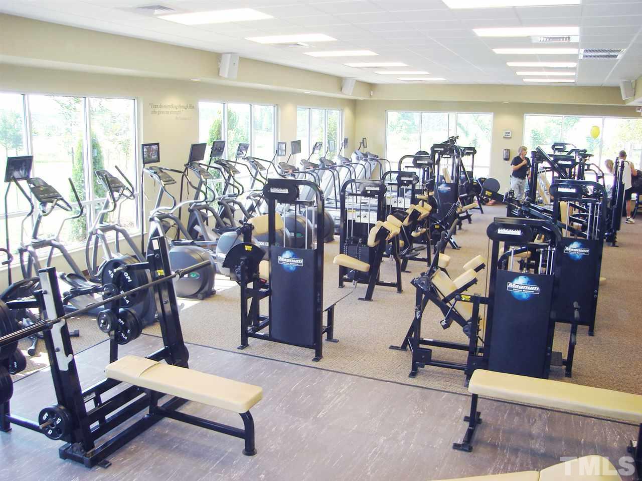 142 Jade Street Smithfield, NC 27577 - Photo 6 of 10 a very nice looking room with lots of gym equipment