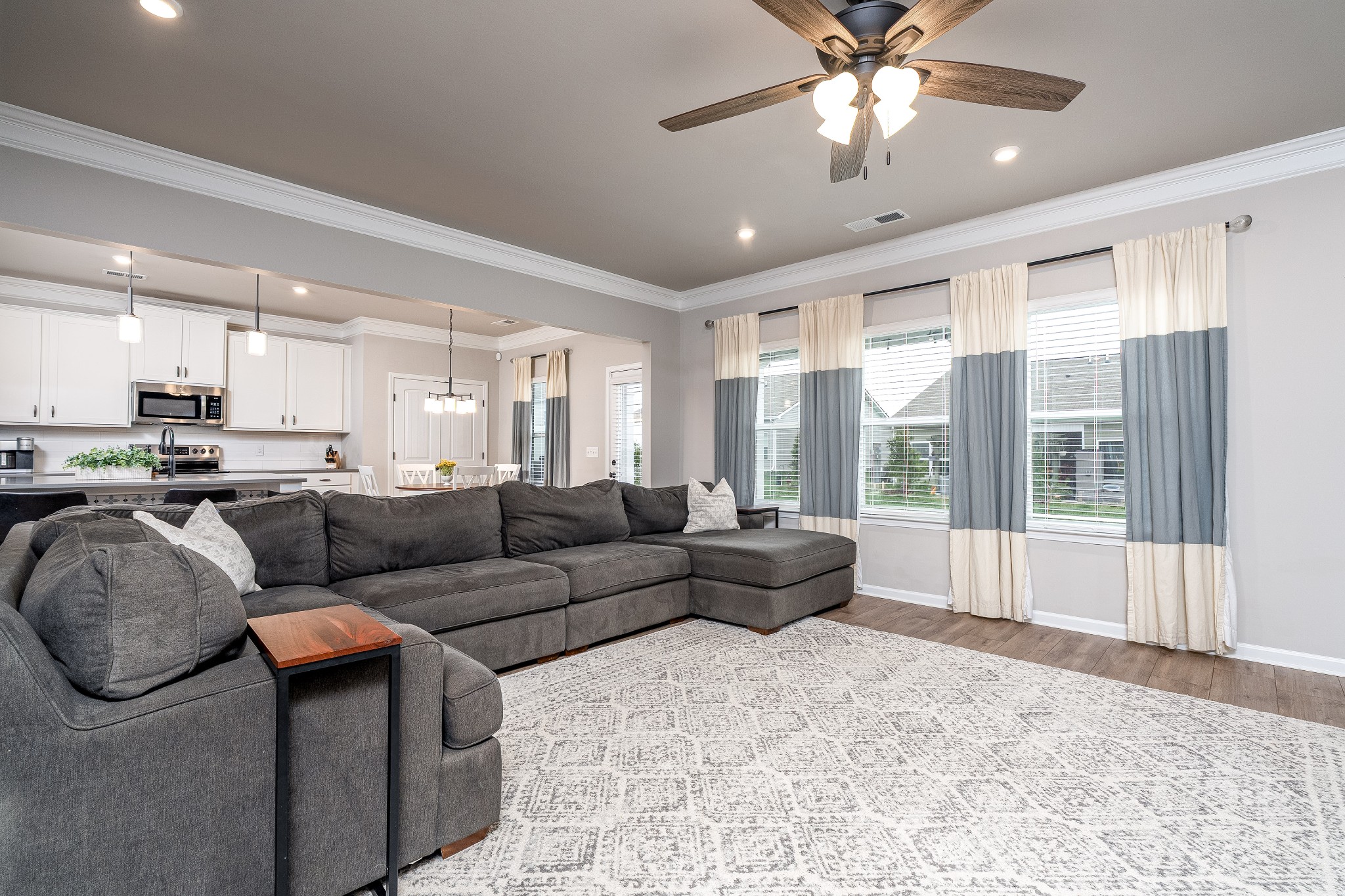 2991 Timewinder Way Columbia, TN 38401 - Photo 14 of 33 a living room with furniture and a large window with kitchen view