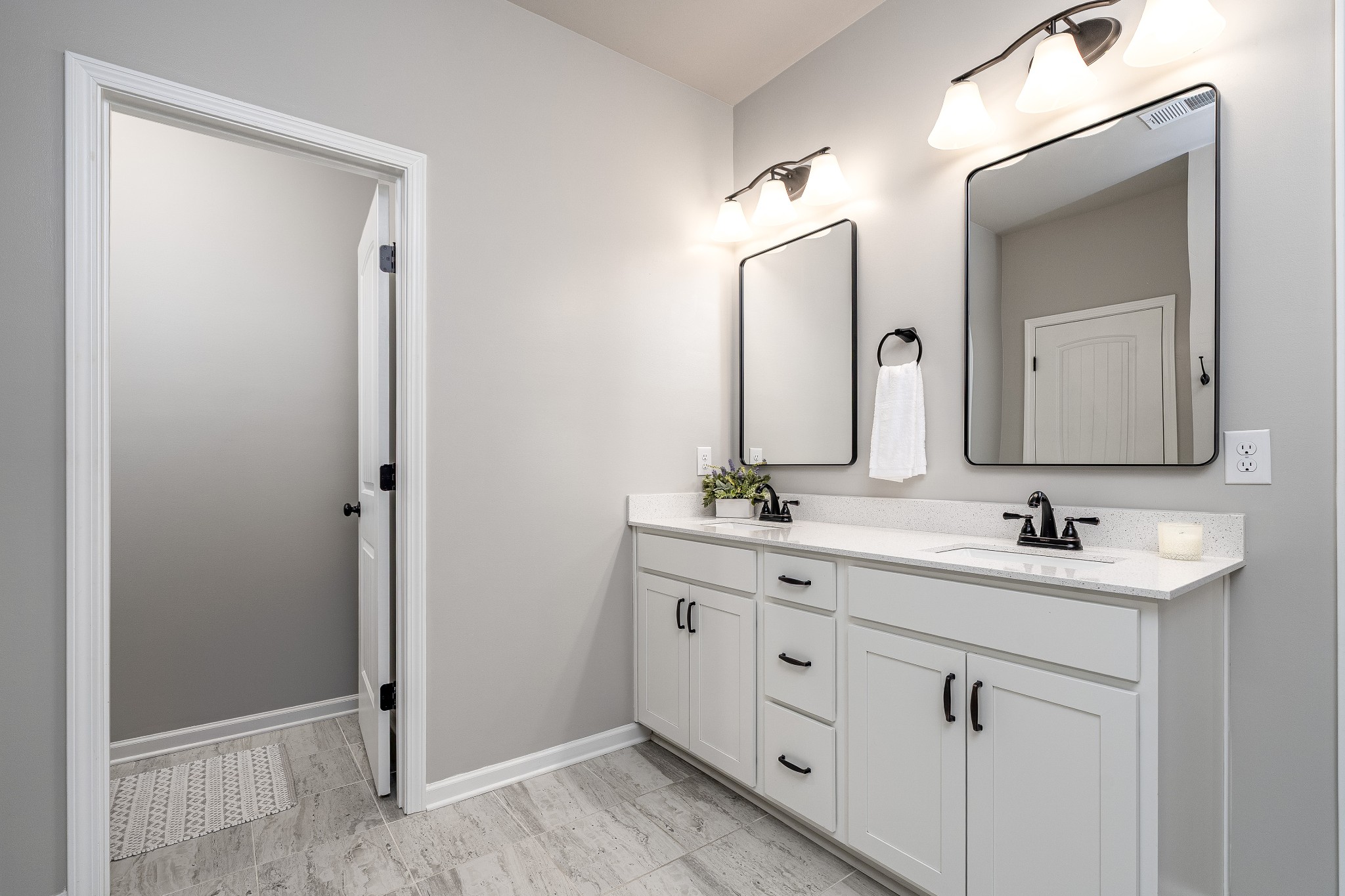 2991 Timewinder Way Columbia, TN 38401 - Photo 27 of 33 a bathroom with a double vanity sink and mirror
