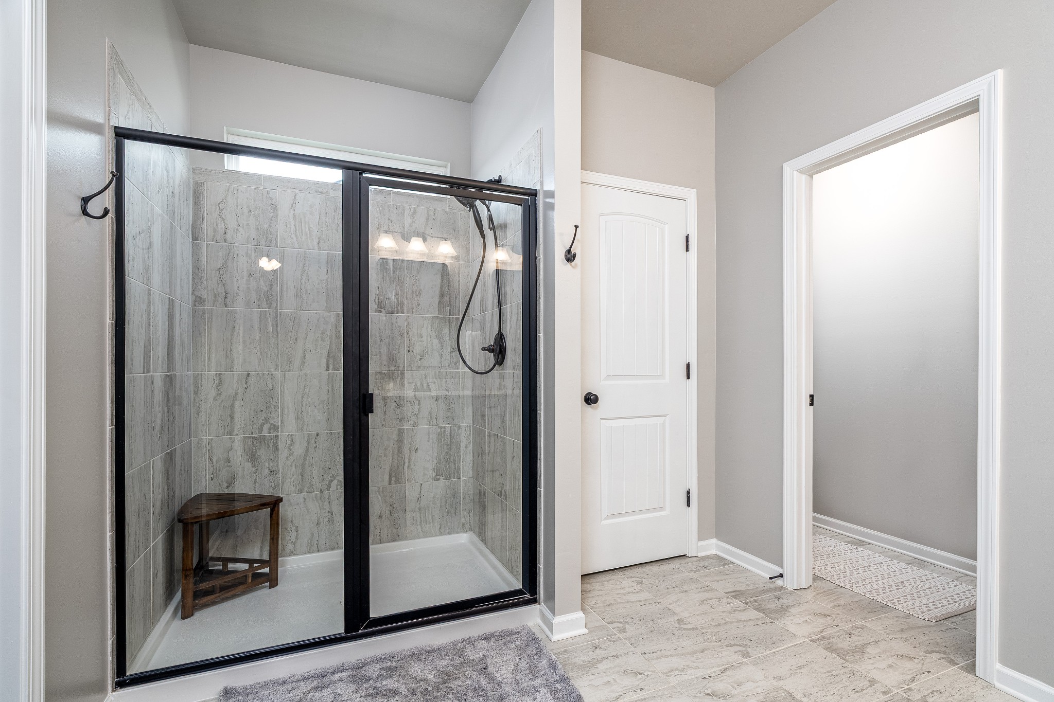 2991 Timewinder Way Columbia, TN 38401 - Photo 28 of 33 a bathroom with a glass shower door