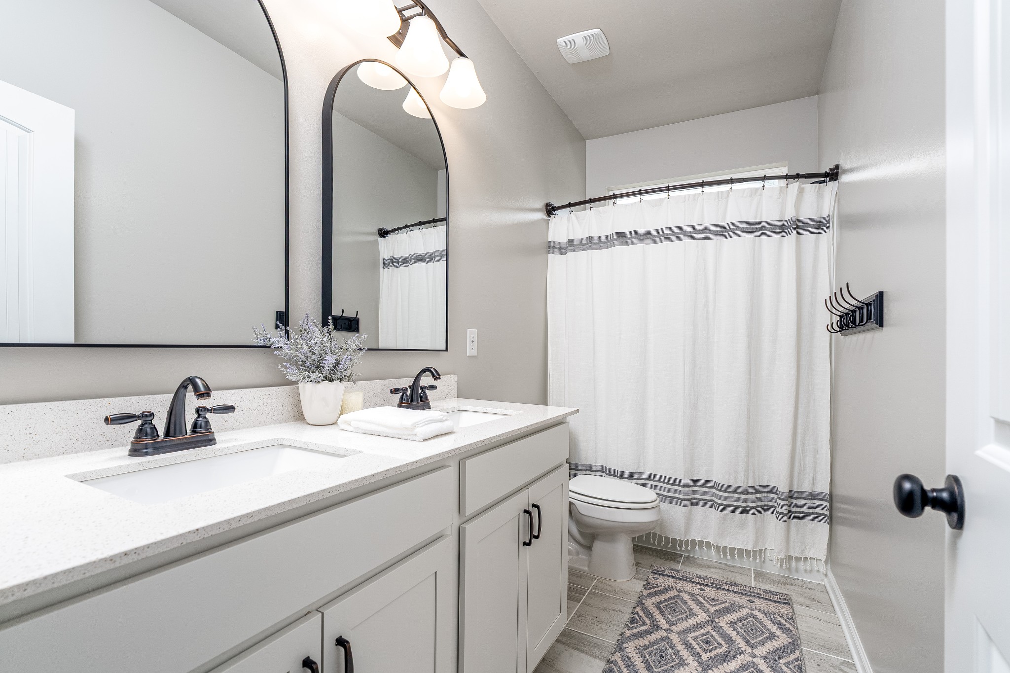2991 Timewinder Way Columbia, TN 38401 - Photo 30 of 33 a bathroom with a double vanity sink mirror and toilet