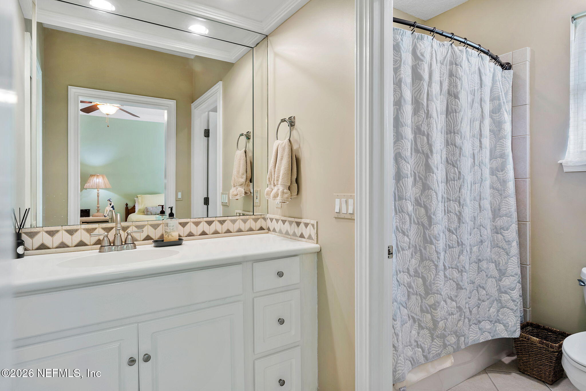 160 Governors Road Ponte Vedra Beach, FL 32082 - Photo 33 of 72 a bathroom with a double vanity sink and a mirror