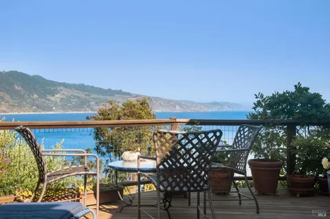 a view of balcony with seating space