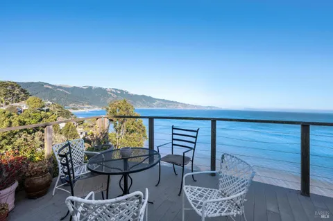 a view of a terrace with furniture