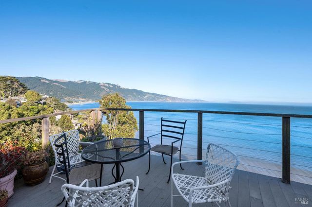 a view of a terrace with furniture