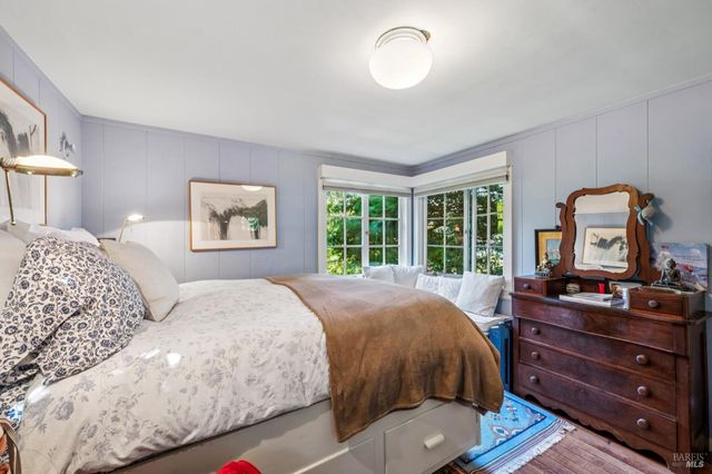 a bed room with a bed and a couch