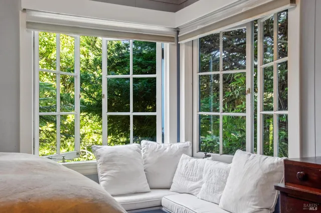 a view of an ocean with a mountain