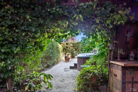 a view of a chairs and tables in patio