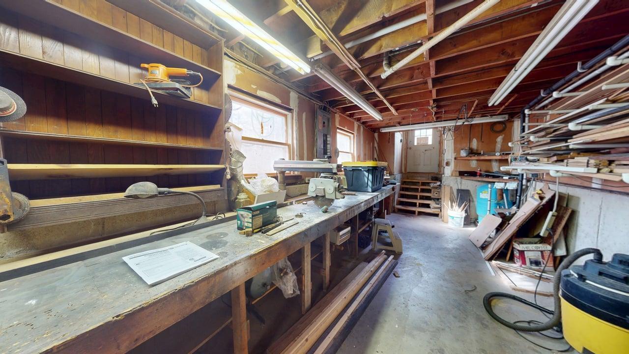 90 Woodridge Road Brewer, ME 04412 - Photo 57 of 74 Utility Room and Work Bench