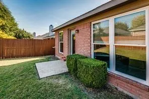 a view of a backyard with large garden