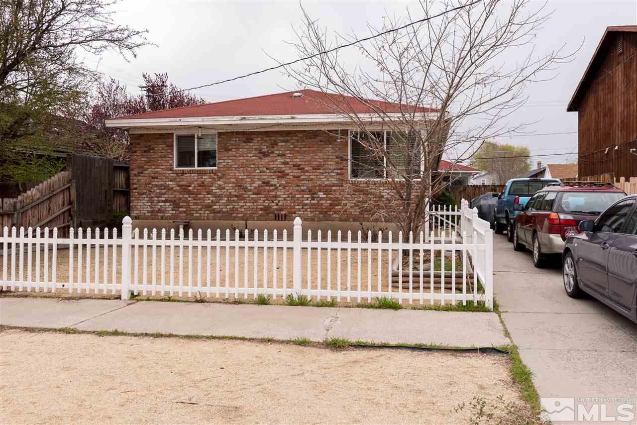 917 Ralston Street Reno, NV 89503 - Photo 1 of 20 a front view of a house with a garden