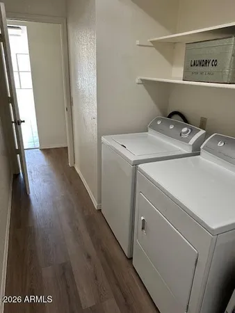 a utility room with dryer and washer